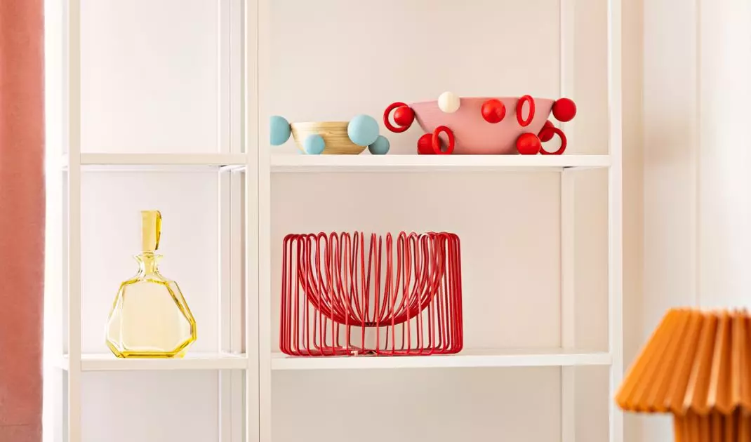 Colorful glass, bowls with spherical forms and fancy lamps complete this unique arrangement
