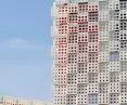 The facades of the pavilion are made of perforated aluminum