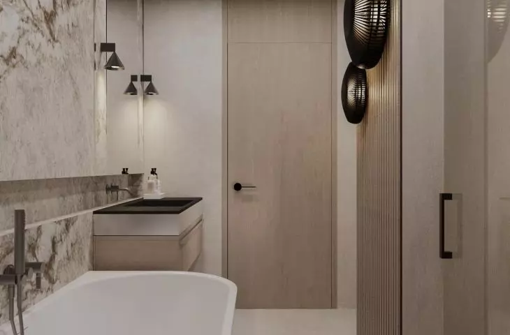 The large bathroom has a bathtub, while the smaller one contains a shower 