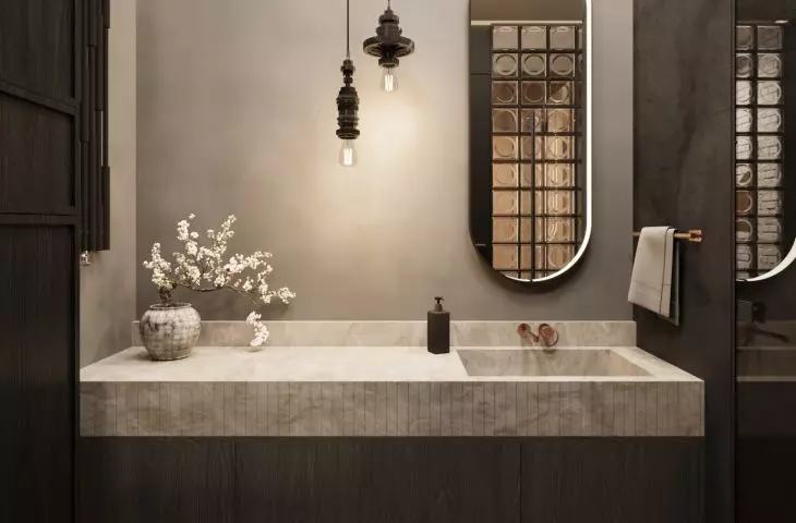 The small bathroom included a shower and a spacious sink area