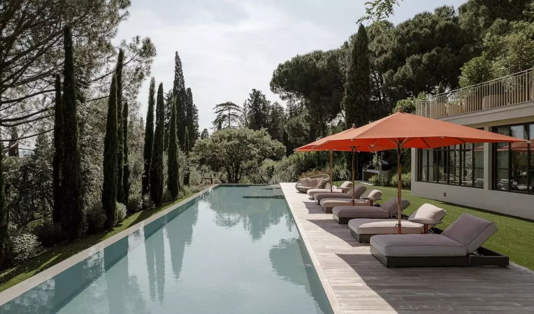 Cottage opens to pool and teak terrace