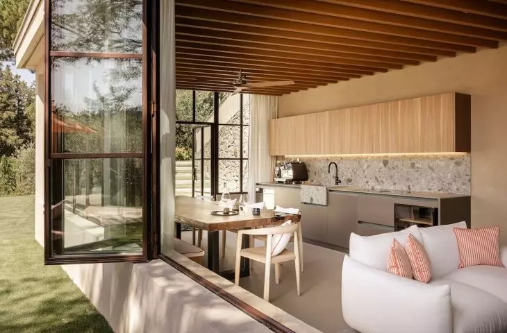 The former greenhouse has been converted into a pool house