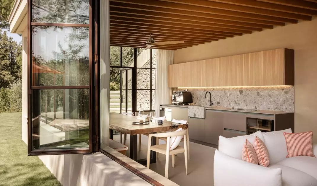 The former greenhouse has been converted into a pool house