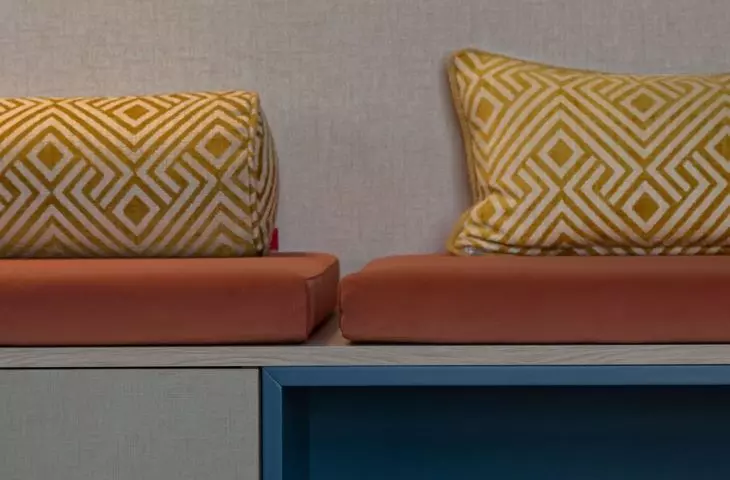 Deep blue is juxtaposed here with energetic yellow and orange