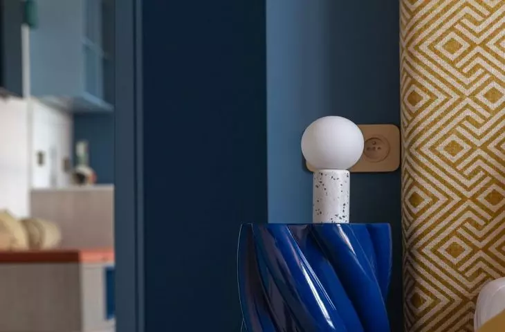 Next to the bed you will find a bedside table with an interesting spiral form