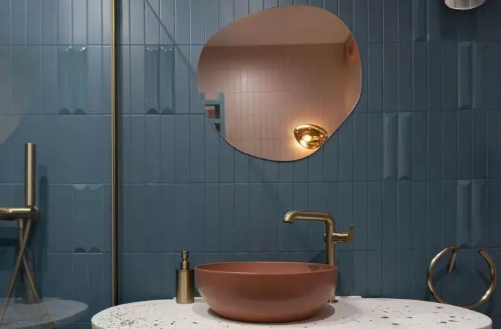 The cabinet is color-matched to the washbasin