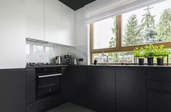 Comfortable interior - contrasting kitchen cabinets