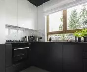 Comfortable interior - contrasting kitchen cabinets