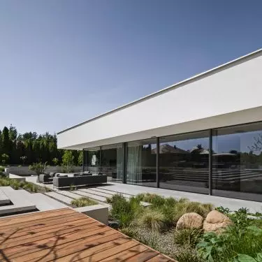 Minimalist architecture of a single-family single-storey house near Lublin with full-height glazing