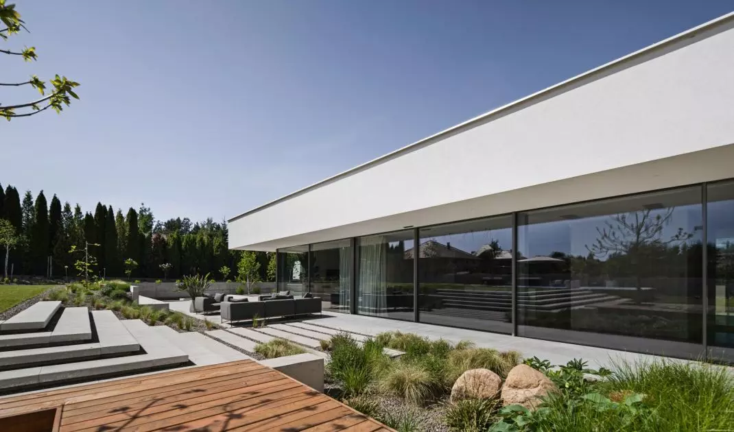 Minimalist architecture of a single-family single-storey house near Lublin with full-height glazing