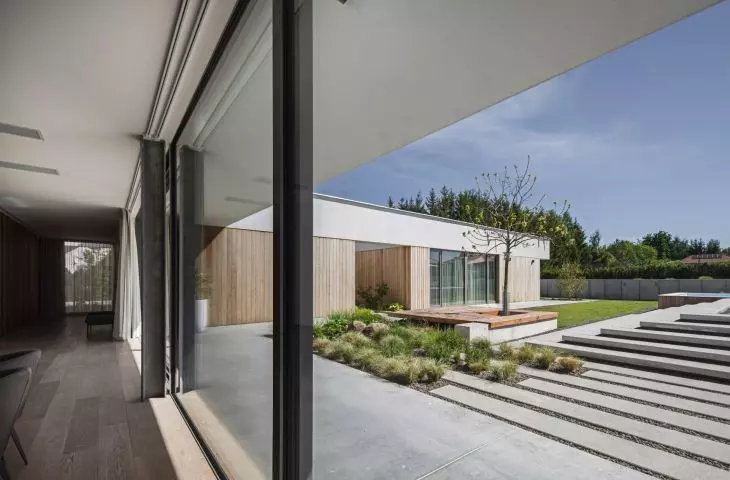 The contrast between the closed west facade and the open, glazed east side is an example of conscious design