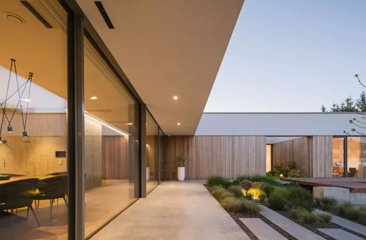 The contrast between the closed west facade and the open, glazed east side is an example of conscious design