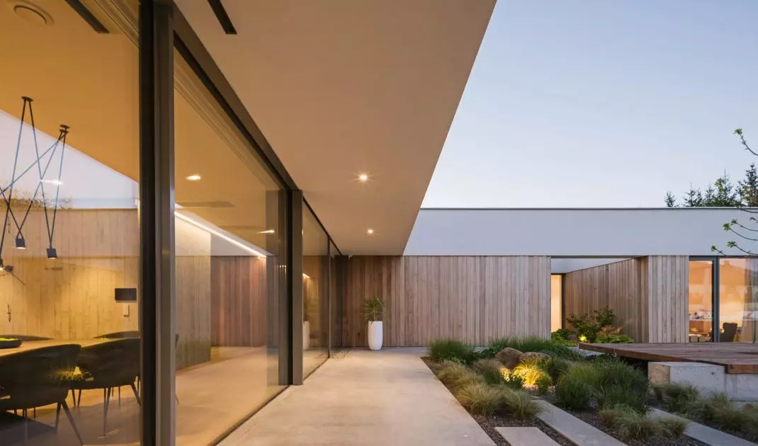 The contrast between the closed west facade and the open, glazed east side is an example of conscious design
