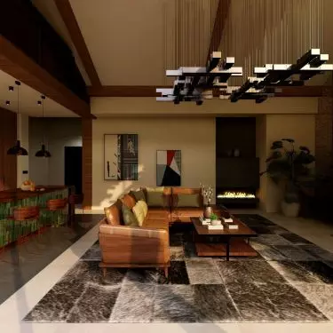 Leather corner sofa in caramel shade is the heart of the living room - it invites you to relax in a unique atmosphere