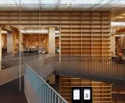 Interior view of Sou Fujimoto's Spiral Library - monumental bookcases create a labyrinth of knowledge in the heart of Gunma