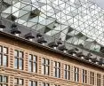The glass superstructure resembles a finely cut diamond