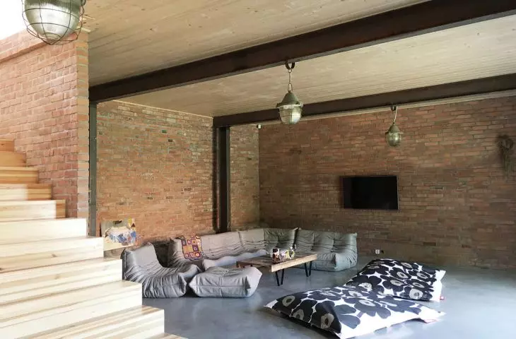 First floor of house with preserved original brick on walls