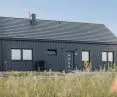 Cedral Click Smooth fiber-cement boards on the facade of a frame house