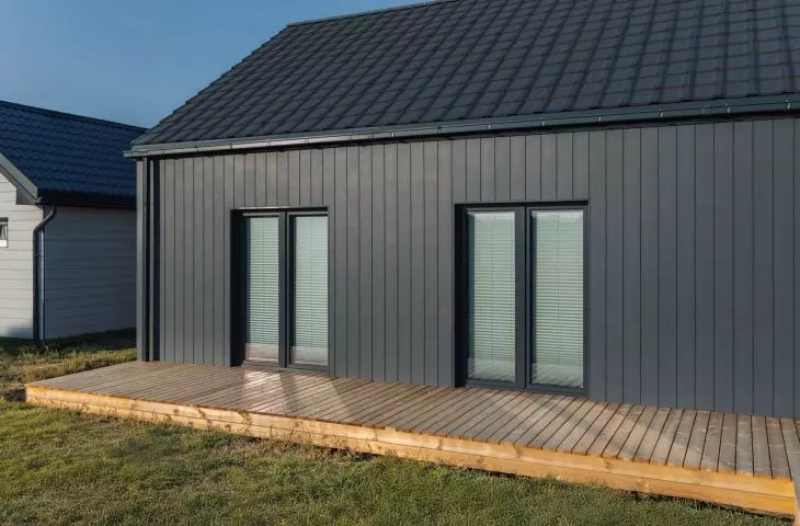 Cedral Click Smooth fiber-cement boards on the facade of a frame house