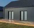Cedral Click Smooth fiber-cement boards on the facade of a frame house