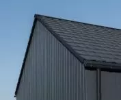 Cedral Click Smooth fiber-cement boards on the facade of a frame house
