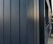 Cedral Click Smooth fiber-cement boards on the facade of a frame house