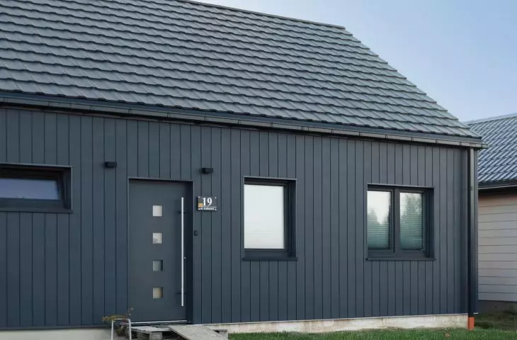 Cedral Click Smooth fiber-cement boards on the facade of a frame house