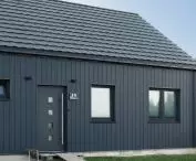 Cedral Click Smooth fiber-cement boards on the facade of a frame house