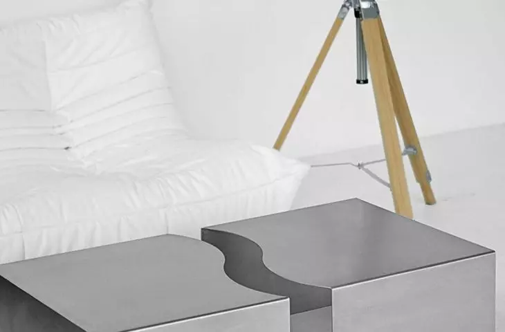 Quite luxury arrangements are all about texture - brushed steel juxtaposed with velour, linen or raw wood creates depth and visual balance