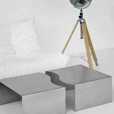 Quite luxury arrangements are all about texture - brushed steel juxtaposed with velour, linen or raw wood creates depth and visual balance