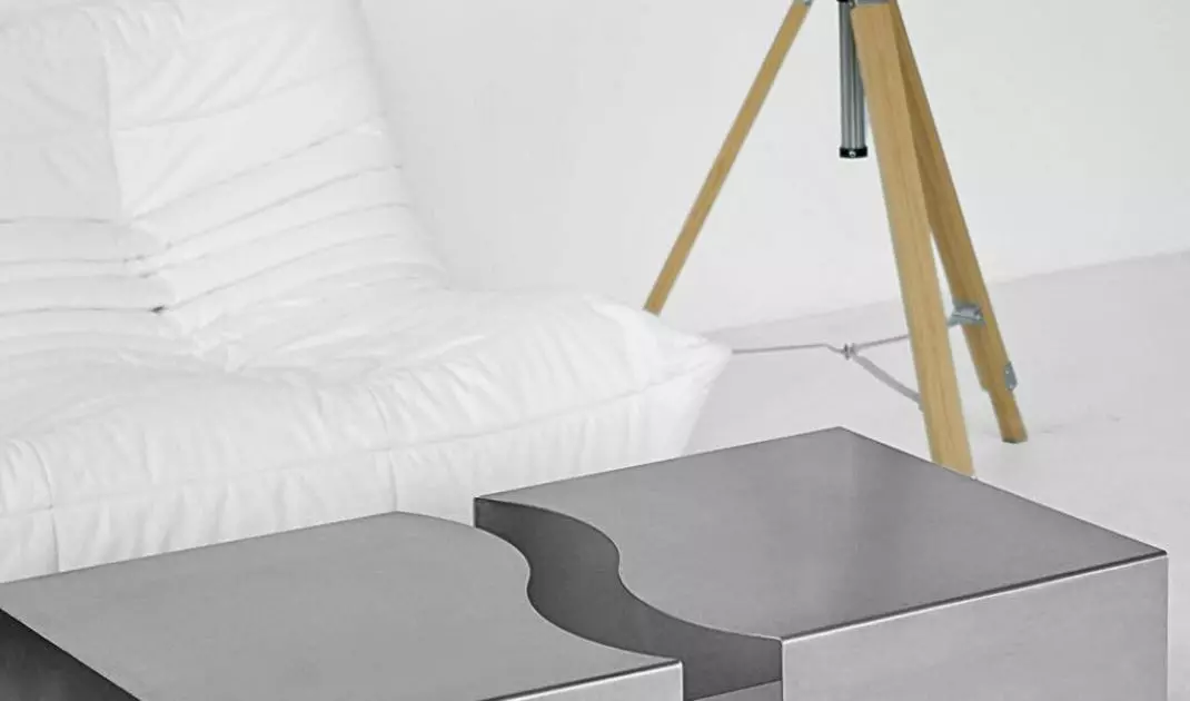 Quite luxury arrangements are all about texture - brushed steel juxtaposed with velour, linen or raw wood creates depth and visual balance
