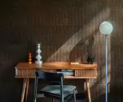 on the walls are panels made of natural cork of different shades and textures (called 3D Tatami)