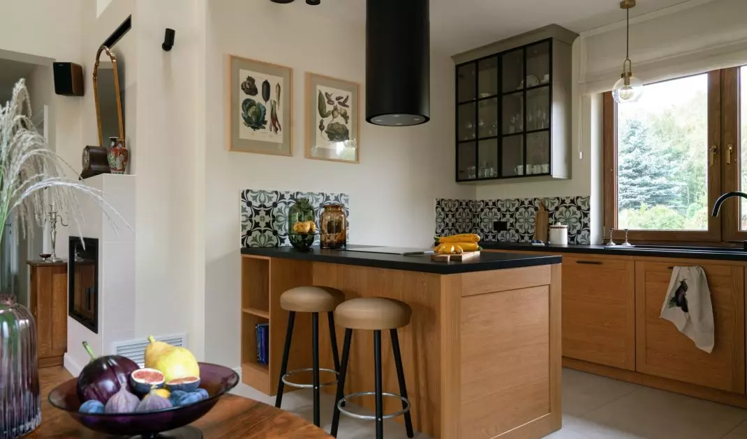 The kitchen is dominated by light olive green - the owner's favorite color