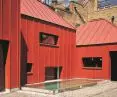 TIN HOUSE, LONDON Architect: Henning Stummel, Henning Stummel Architects Ltd. Product: GreenCoat PLX Pro BT Color: Brick Red RR7F2 / SS0742