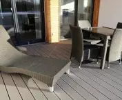 Terrace made of Gardin Plus composite boards on aluminum joists