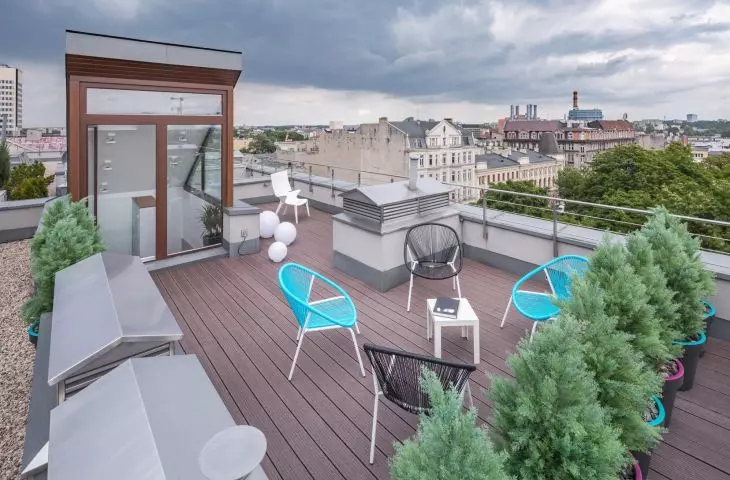 Terrace made of composite boards on a structure made of system aluminum joists