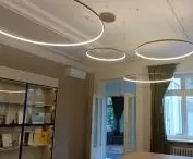 Gold Orbit S LED ring lights in a representative office space