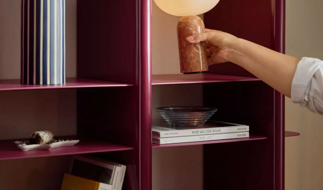 The bookcase gets a new dimension with simple lighting treatments