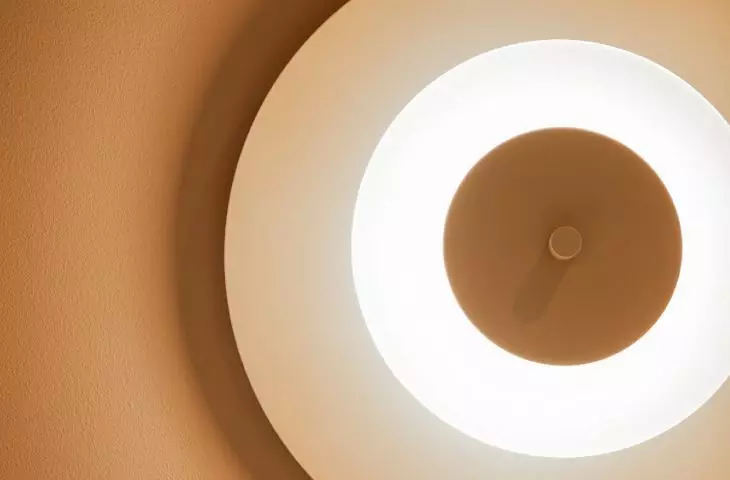 The interior is decorated with circular lamps designed by Cezary Zadrożny