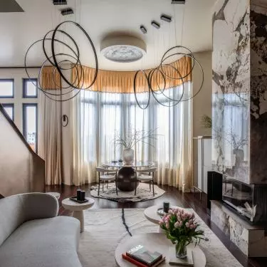 The first floor of the apartment is organized around a spacious living area
