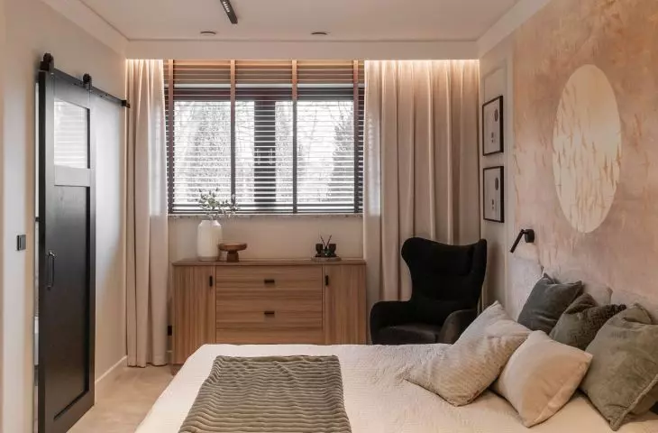 The bedroom is dominated by beige 