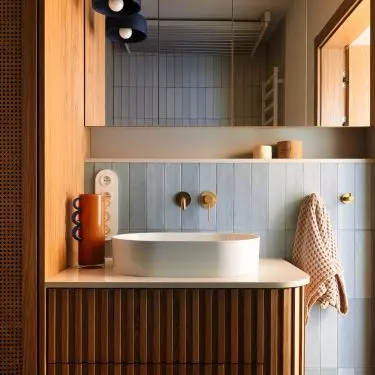 The apartment has two, but completely different style bathrooms