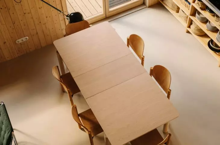 view from the mezzanine to the dining room and kitchen