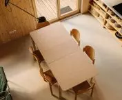 view from the mezzanine to the dining room and kitchen