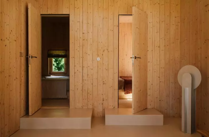 in the lower part of the house there are two bedrooms