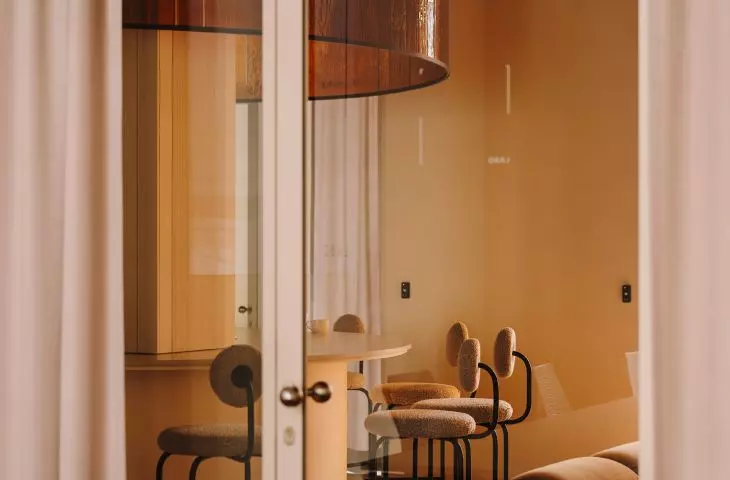 individual offices are separated by high glazing