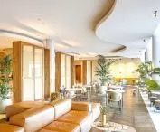 Oriental touches at the Van der Valk Eindhoven-Best hotel harmonize with the chain's trademark colorful toucan.