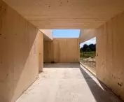 Construction of a FINN house in the village of Ossy