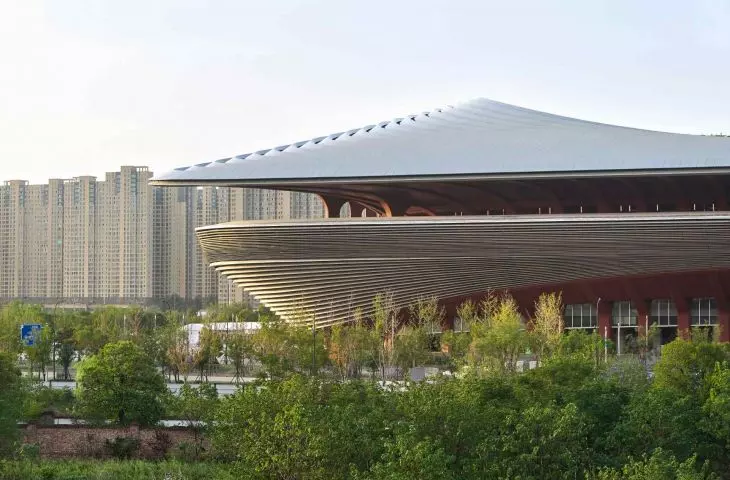 The stadium is distinguished by its streamlined form and the use of modern technologies to minimize environmental impact