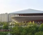The stadium is distinguished by its streamlined form and the use of modern technologies to minimize environmental impact